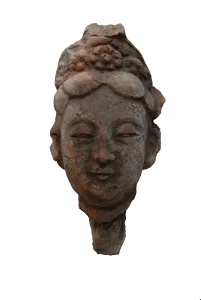 Head of a Galbinga sculpture with an updo hairstyle and floral hair ornament.